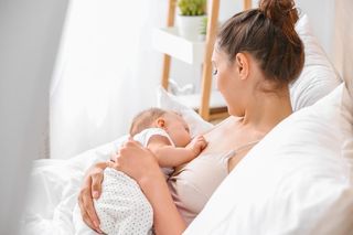 Mother breastfeeding baby